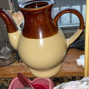A vintage coffee pot or water pot crockery